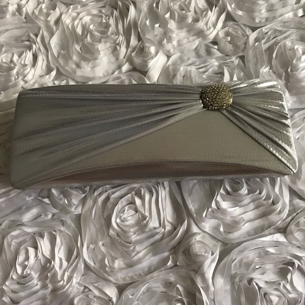 Silver clutch handbag with chain straps